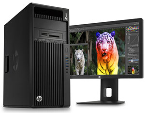 Z440 A computer monitor displays a colorful tiger while it sits next to a black desktop